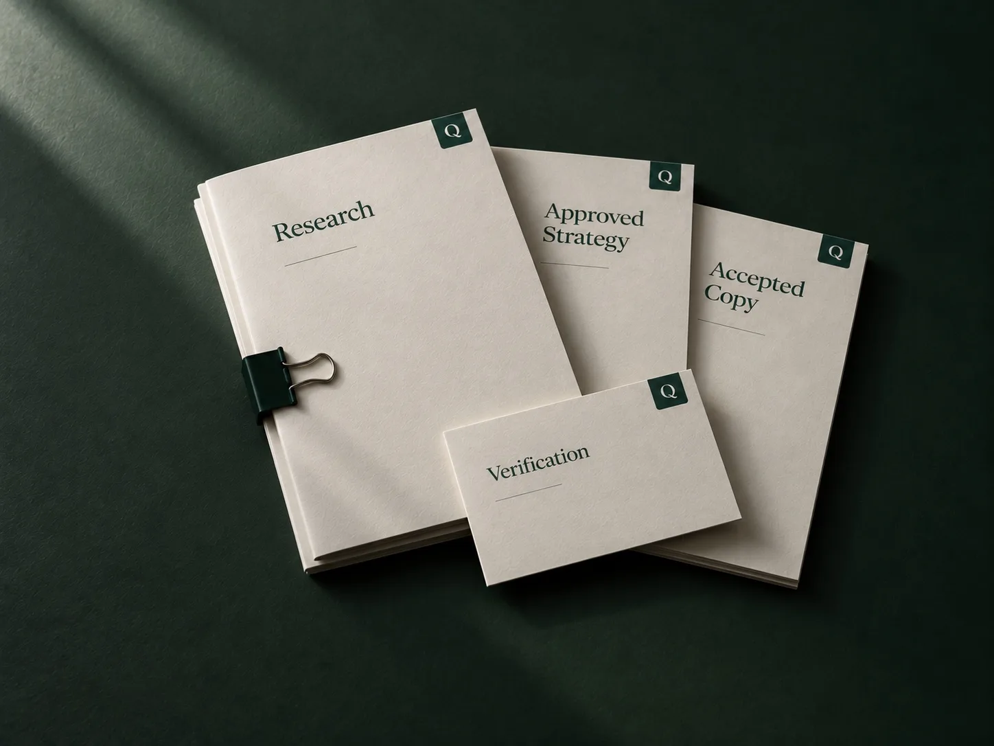 A clipped bundle of Querywright booklets: Research, Approved Strategy, and Accepted Copy, with a Verification card on top.