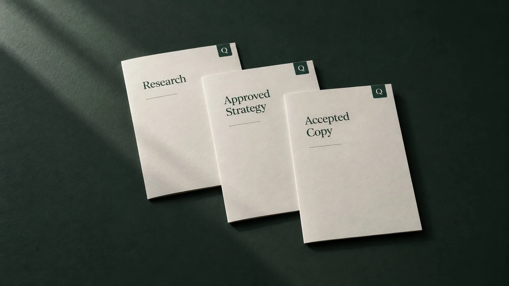 Three Querywright booklets laid in sequence: Research, Approved Strategy, Accepted Copy.